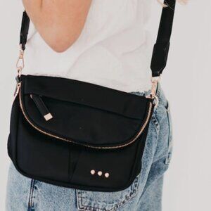 NWT Crossbody with tons of pockets Black and Blue